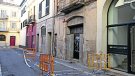 Despreniments en una façana del carrer Tortellà